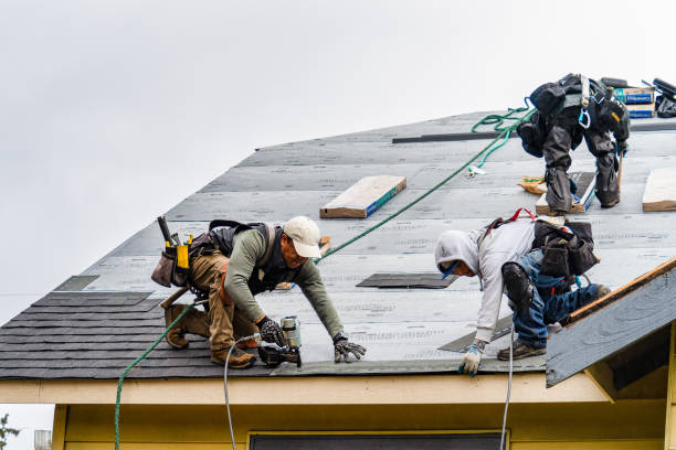 Professional Gutter Installation technician working in Palo Alto, CA